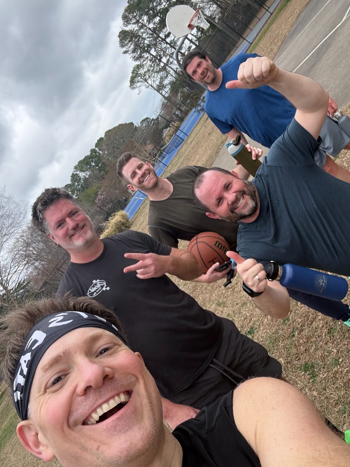 BAMF players selfie near the basketball court