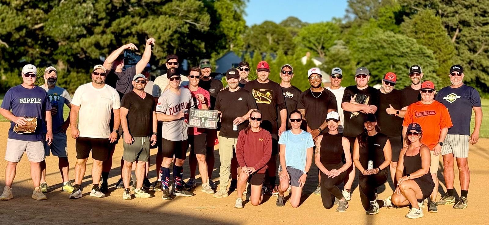 Dad Bod League softball group photo on the field